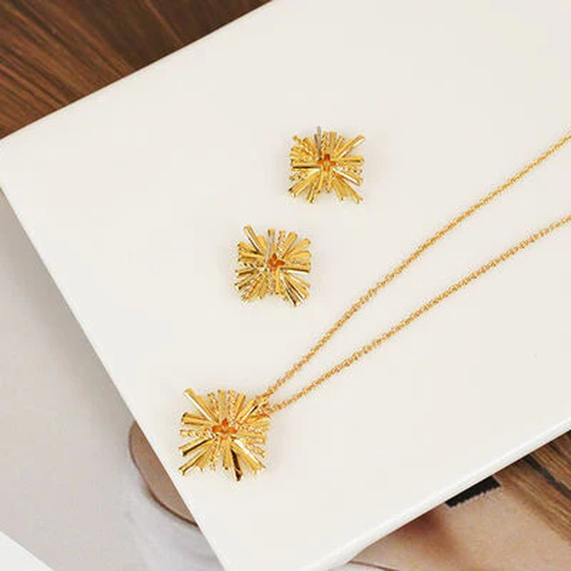 Radiant Starburst Gold-Plated Earrings & Necklace Set - Elevate Your Elegance!