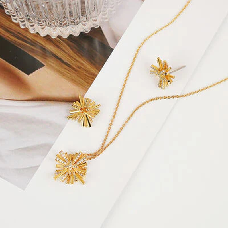 Radiant Starburst Gold-Plated Earrings & Necklace Set - Elevate Your Elegance!